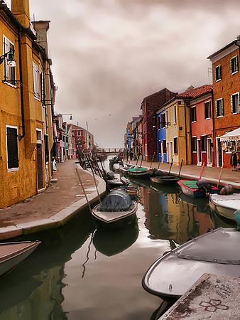 The mist rolling in from the sea in Burano, Italy.