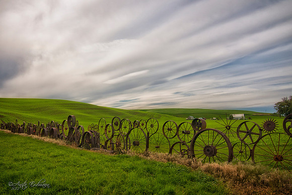 Uniontown Wheel Fence, the Palouse - WashingtonSteve and Junette Dahmen bought the property at the NW corner of Uniontown in the 1950s. What began as a gate building project expanded dramatically when